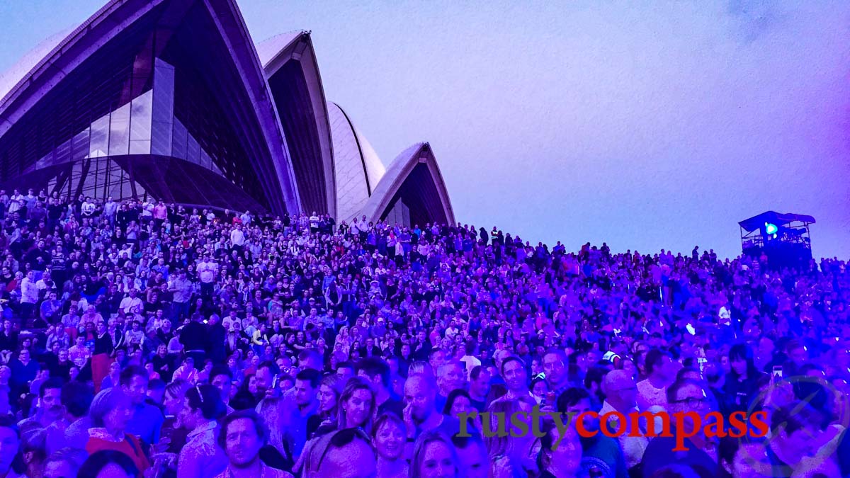 Neil Finn concert on the forecourt and Sydneysiders having too much fun. Powerful new Opera House neighbours are opposed to such events. Opera Houses should be seen, not heard.
